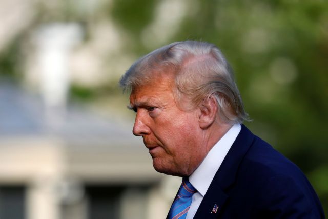 U.S. President Donald Trump walks on the South Lawn of the White House upon his return to Washington, U.S., after a weekend in Bedminster, New Jersey, June 14, 2020. REUTERS/Yuri Gripas