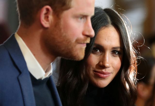 Britain's Prince Harry and his fiancee Meghan Markle attend a reception for young people at the Palace of Holyroodhouse in Edinburgh, Britain February 13, 2018. REUTERS/Andrew Milligan/Pool