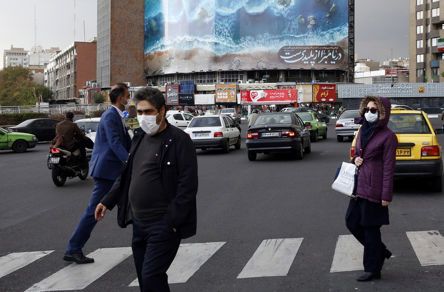 epa08819934 Pedestrians and traffic in a street in Valiasr Square in Tehran, Iran, 14 November 2020. Iran has denied claims that the second highest leader of the terror network al-Qaeda, who is said to be responsible for the bombings of the United States Embassies in Dar es Salaam, Tanzania, and Nairobi in 1998, was allegedly killed in Iran in August 2020. The New York Times reported that Abdullah Ahmed Abdullah, who was also known as Abu Mohamed Al-Masri, was shot by two men on a motorcycle in Tehran.  EPA/ABEDIN TAHERKENAREH