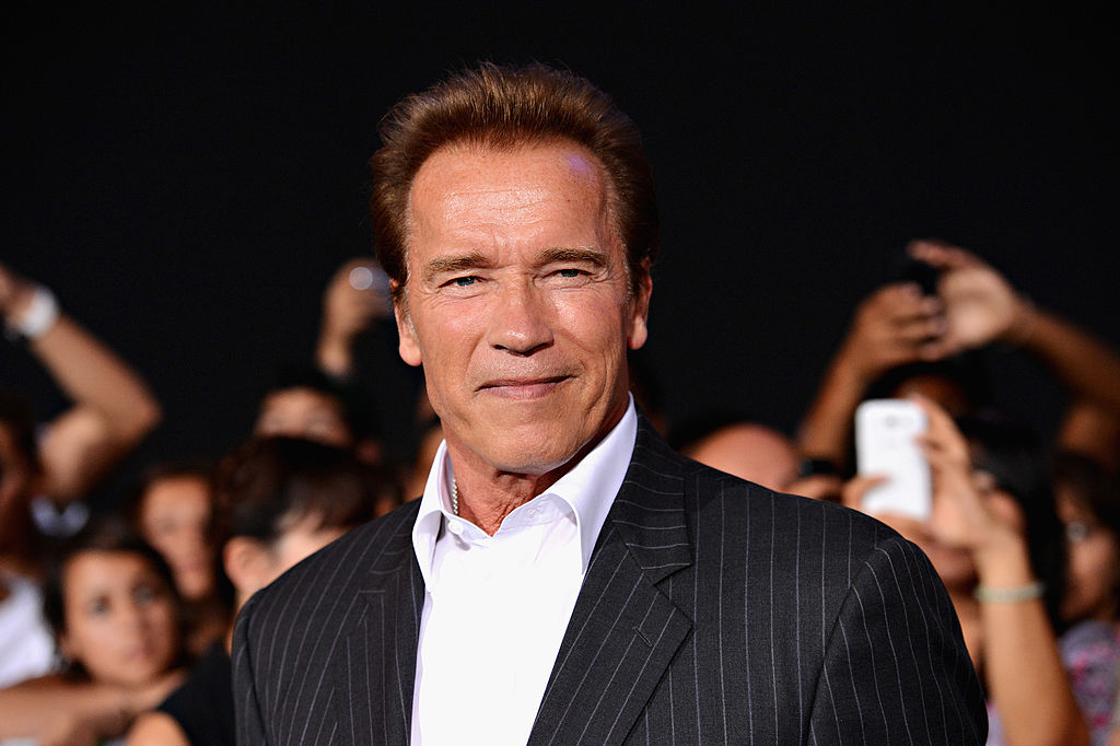 HOLLYWOOD, CA - AUGUST 15:  Actor Arnold Schwarzenegger arrives at Lionsgate Films' "The Expendables 2" premiere on August 15, 2012 in Hollywood, California.  (Photo by Jason Merritt/Getty Images)