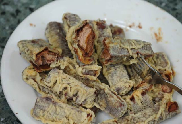 A plate of Scottish deep fried Mars Bars, Twix Bars and Toblerones at the 42nd International Union of Pure and Applied Chemistry (IUPAC) Conference which is being hosted in Glasgow by The Royal Society of Chemistry.