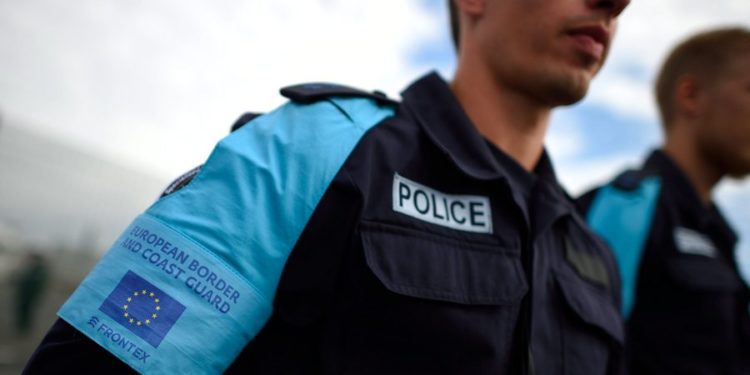 epa05572659 A German Border policeman poses during the official launch of the European Border and Coast Guard at the check point Kapitan Andreevo some 350 km from Sofia, Bulgaria, 06 October 2016. The new European Border and Coast Guard Agency started its operation along the Bulgarian-Turkish border at Kapitan Andreevo checkpint, the biggest border crossing from EU member state Bulgaria to Turkey. Built on Frontex, the new Agency will ensure stronger shared management of the EU's external borders. European Commission President Jean-Claude Juncker called, in his state of the union speech to the European Parliament, on member states to deploy extra border guards and 50 vehicles to Bulgaria by October.  EPA/VASSIL DONEV