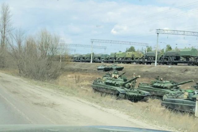 FILE PHOTO: A still image from video shows tanks and military vehicles in Maslovka, Voronezh Region, Russia April 6, 2021. Video taken April 6, 2021. Video by REUTERS. THIS IMAGE WAS PROCESSED BY REUTERS TO ENHANCE QUALITY, AN UNPROCESSED VERSION HAS BEEN PROVIDED SEPARATELY./File Photo