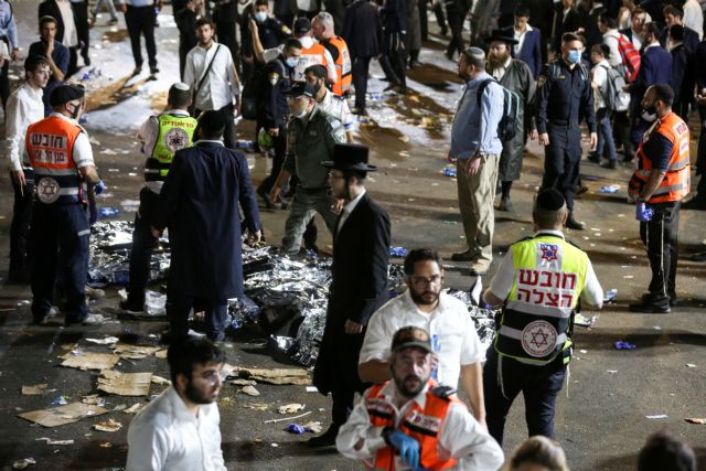 Medics and rescue workers attend to the Lag B'Omer event in Mount Meron, northern Israel, where fatalities were reported among the thousands of ultra-Orthodox Jews gathered at the tomb of a 2nd-century sage for annual commemorations that include all-night prayer and dance, at Mount Meron, Israel April 30, 2021. REUTERS/ David Cohen-JINIPIX/ ATTENTION EDITORS - ISRAEL OUT. NO COMMERCIAL OR EDITORIAL SALES IN ISRAEL     TPX IMAGES OF THE DAY