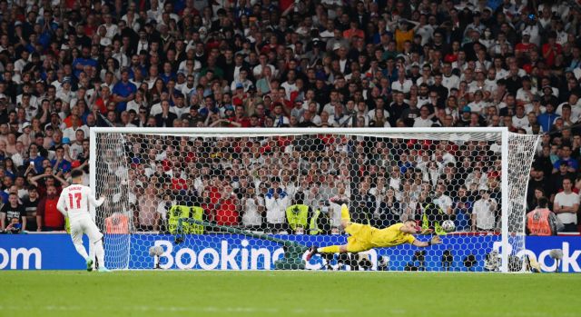 Soccer Football - Euro 2020 - Final - Italy v England - Wembley Stadium, London, Britain - July 11, 2021 England's Jadon Sancho has his penalty saved during a penalty shootout Pool via REUTERS/Paul Ellis