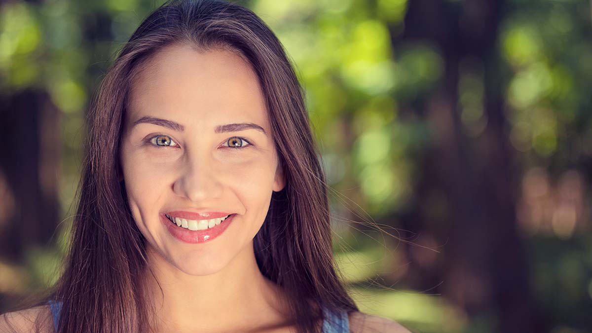 Portrait of a pretty happy woman, smiling