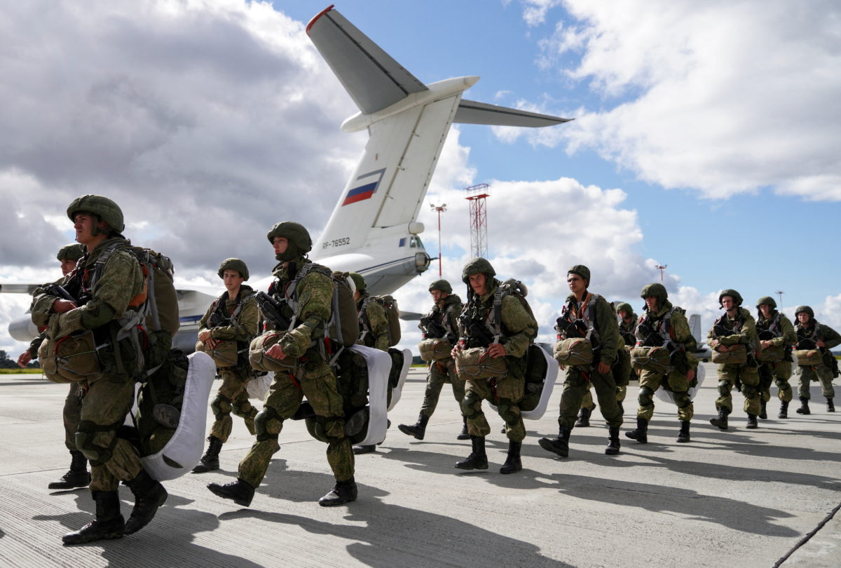 FILE PHOTO: Russian paratroopers walk before boarding Ilyushin Il-76 transport planes as they take part in the military exercises "Zapad-2021" staged by the armed forces of Russia and Belarus at an aerodrome in Kaliningrad Region, Russia, September 13, 2021. REUTERS/Vitaly Nevar/File Photo