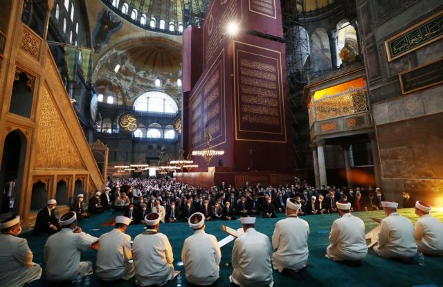 Turkey's President Tayyip Erdogan attends Friday prayers at Hagia Sophia Grand Mosque, for the first time after it was once again declared a mosque after 86 years, in Istanbul, Turkey, July 24, 2020. Murat Cetinmuhurdar/PPO/Handout via REUTERS THIS IMAGE HAS BEEN SUPPLIED BY A THIRD PARTY. NO RESALES. NO ARCHIVES.