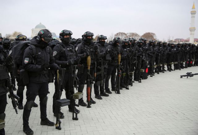 Service members gather in a square during head of the Chechen Republic Ramzan Kadyrov's address, dedicated to a military conflict in Ukraine, in Grozny, Russia February 25, 2022. REUTERS/Chingis Kondarov