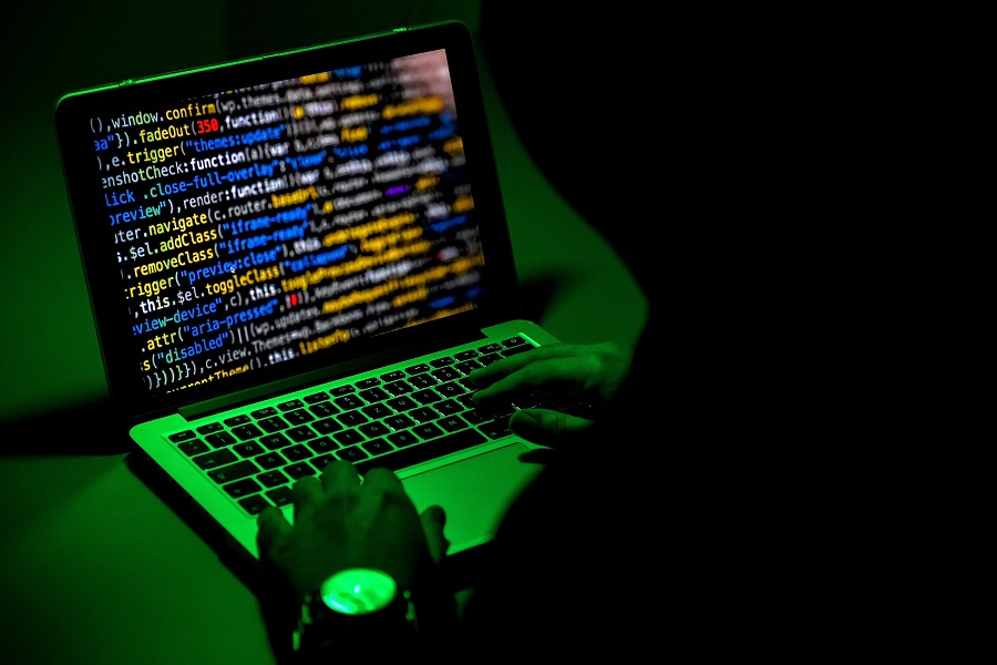 epa07261864 ILLUSTRATION - A person sits in front of a computer screen in Moers, Germany, 04 January 2019. Reports on 04 January 2019 state personal data of hundreds of German politicians, celebrities and journalists have been hacked and posted online. The compromised data reportedly includes credit card details, private chat protocols and contact information. The data was allegedly shared via a Twitter account under the name G0d (@_0rbit) prior to Christmas 2018, which has been suspended in the meantime.  EPA/SASCHA STEINBACH