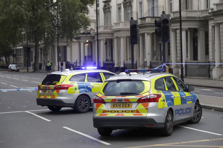 Britain's police cars at the scene of an incident in central London, Saturday, Oct. 7, 2017. London police say emergency services are outside the Natural History Museum in London after a car struck pedestrians. (AP Photo/Kirsty Wigglesworth)