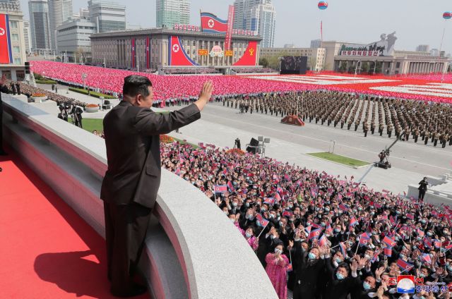 North Korean leader Kim Jong Un waves as he attends a national meeting and a public procession to mark 110th birth anniversary of the state's founder, Kim II Sung, in Pyongyang, North Korea, April 15, 2022. Picture taken April 15, 2022 by North Korea's Korean Central News Agency (KCNA). KCNA via REUTERS    ATTENTION EDITORS - THIS IMAGE WAS PROVIDED BY A THIRD PARTY. REUTERS IS UNABLE TO INDEPENDENTLY VERIFY THIS IMAGE. NO THIRD PARTY SALES. SOUTH KOREA OUT. NO COMMERCIAL OR EDITORIAL SALES IN SOUTH KOREA.