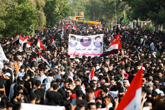 Supporters of the Coordination Framework, a group of Shi'ite parties, gather during a protest, amid a political crisis, near Green Zone, in Baghdad, Iraq August 12, 2022. REUTERS/Thaier Al-Sudani