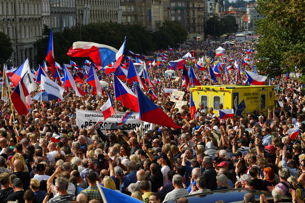 Thousands of demonstrators gather to protest against the government at the Vencesla's Square in Prague, Czech Republic, Saturday, Sept. 3, 2022. (AP Photo/Petr David Josek)