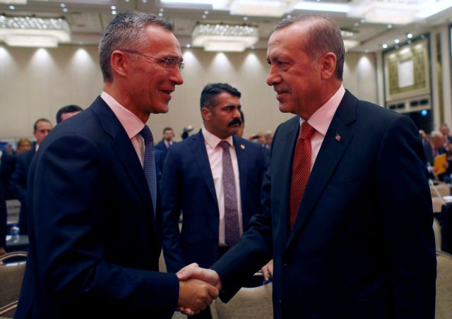 NATO Secretary-General Jens Stoltenberg shakes hands with Turkish President Tayyip Erdogan during the NATO Parliamentary Assembly 62nd Annual Session in Istanbul, Turkey, November 21, 2016. REUTERS/Murad Sezer