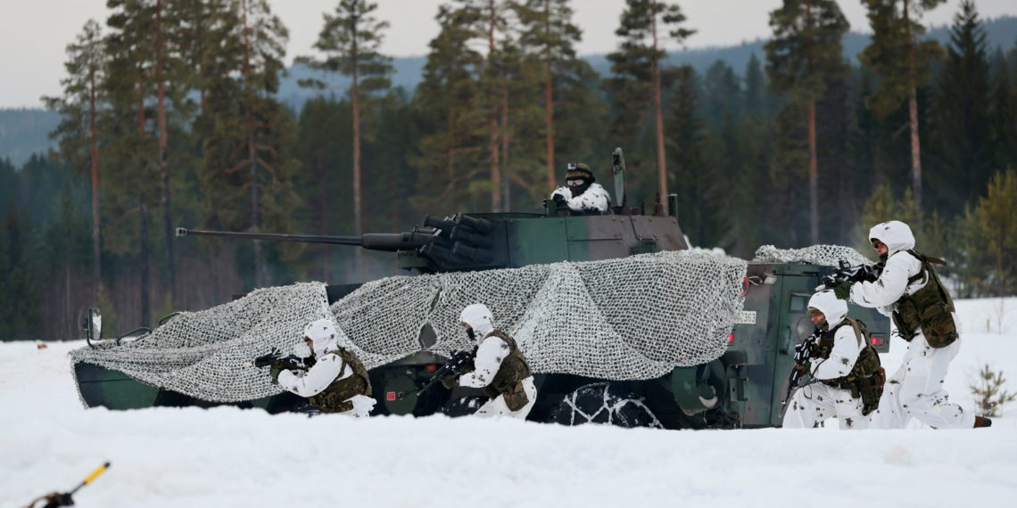 Soldiers take part in Exercise Brilliant Jump 2022, the annual deployment exercise for the NATO Response Force's Very High Readiness Brigade, in Rena, Norway, March 17, 2022. Geir Olsen/NTB/via REUTERS   ATTENTION EDITORS - THIS IMAGE WAS PROVIDED BY A THIRD PARTY. NORWAY OUT. NO COMMERCIAL OR EDITORIAL SALES IN NORWAY.