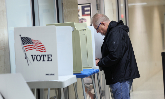 GREEN BAY, WISCONSIN - NOVEMBER 04: Residents cast their ballots during in-person absentee voting at City Hall on November 04, 2022 in Green Bay, Wisconsin. Residents will be able to cast an early ballot at City Hall until November 6.  (Photo by Scott Olson/Getty Images)