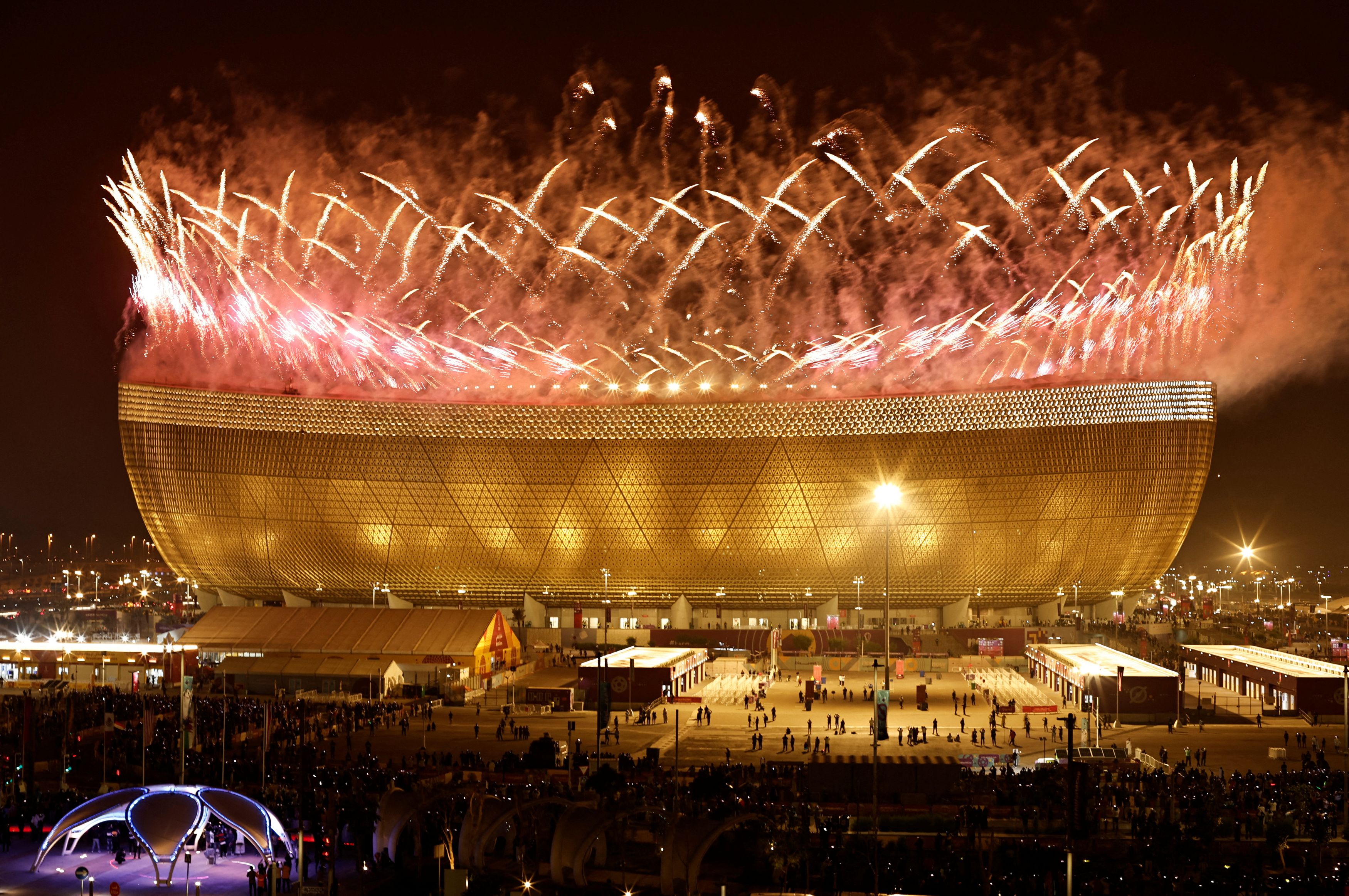 Soccer Football - FIFA World Cup Qatar 2022 - Final - Argentina v France - Lusail Stadium, Lusail, Qatar - December 18, 2022 General view of a pyrotechnic display pictured from outside the stadium after the match REUTERS/Hamad I Mohammed     TPX IMAGES OF THE DAY