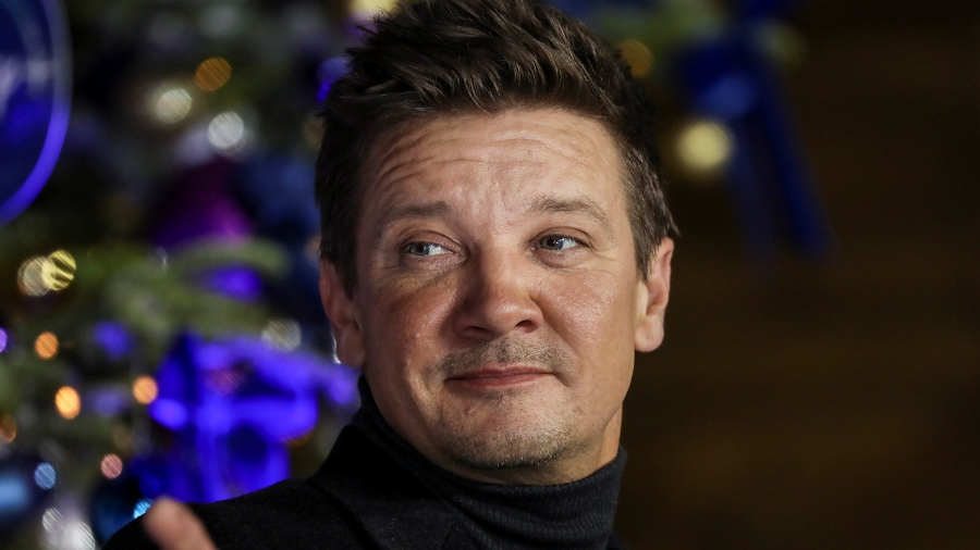 FILE - Jeremy Renner poses for photographers upon arrival at the UK Fan Screening of the film "Hawkeye," in London, Thursday, Nov. 11, 2021. Renner is being treated for serious injuries that happened while he was plowing snow. The actor's representative said Sunday, Jan. 1, 2023, that Renner is in critical condition although he is stable. (Photo by Vianney Le Caer/Invision/AP, File)