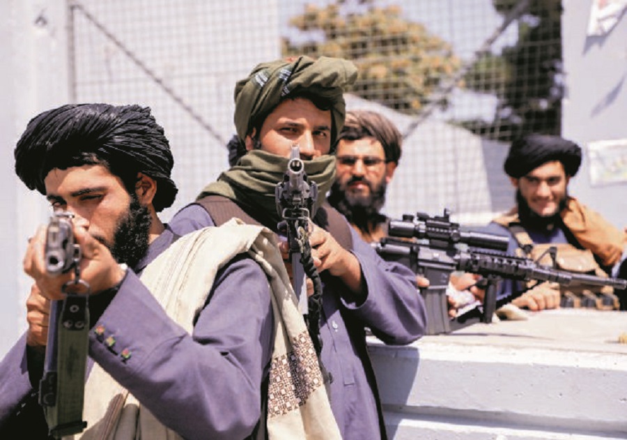 Taliban forces stand guard in front of Hamid Karzai International Airport in Kabul, Afghanistan, September 2, 2021. REUTERS/Stringer