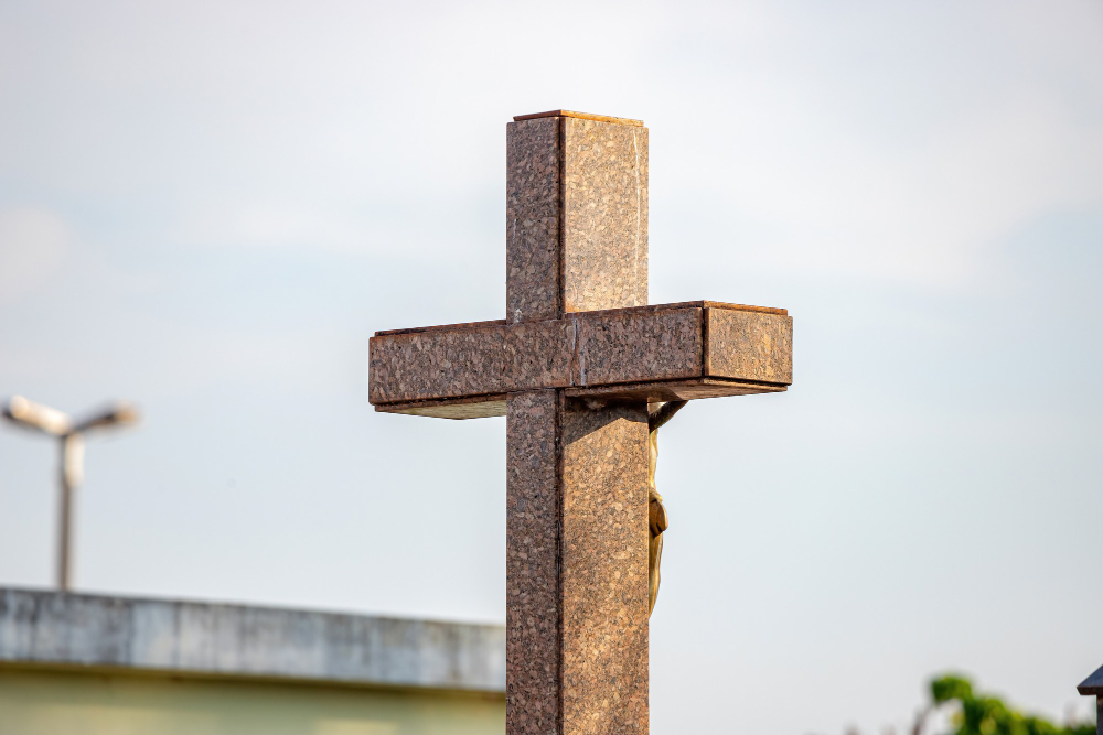 closeup-marble-cross-grave-cemetery