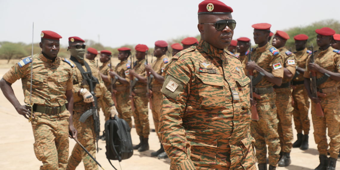 Burkina Faso President Lieutenant Colonel Paul-Henri Damiba is welcomed by soldiers in Dori, Sahel region as he arrives to motivate his troops, after armed men killed civilians and militaries over the weekend in Seytenga, at airport in Dori,  Burkina Faso June 15, 2022. Burkina Faso's Presidential Press Service/Handout via REUTERS ATTENTION EDITORS - THIS IMAGE HAS BEEN SUPPLIED BY A THIRD PARTY.