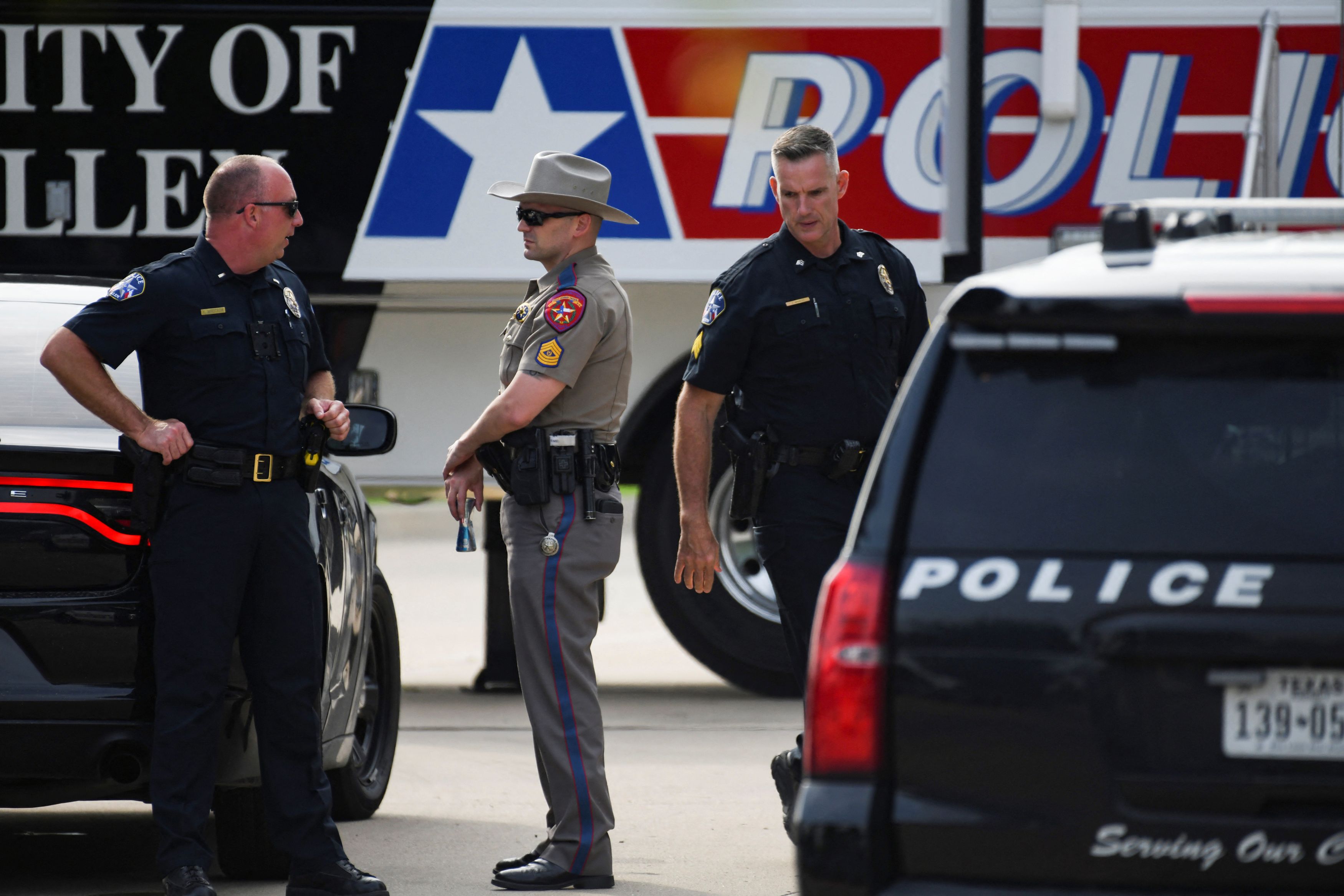 Officers with the Allen Police Department man the mobile command post the day after a gunman shot multiple people at the Dallas-area Allen Premium Outlets mall in Allen, Texas, U.S. May 7, 2023.  REUTERS/Jeremy Lock