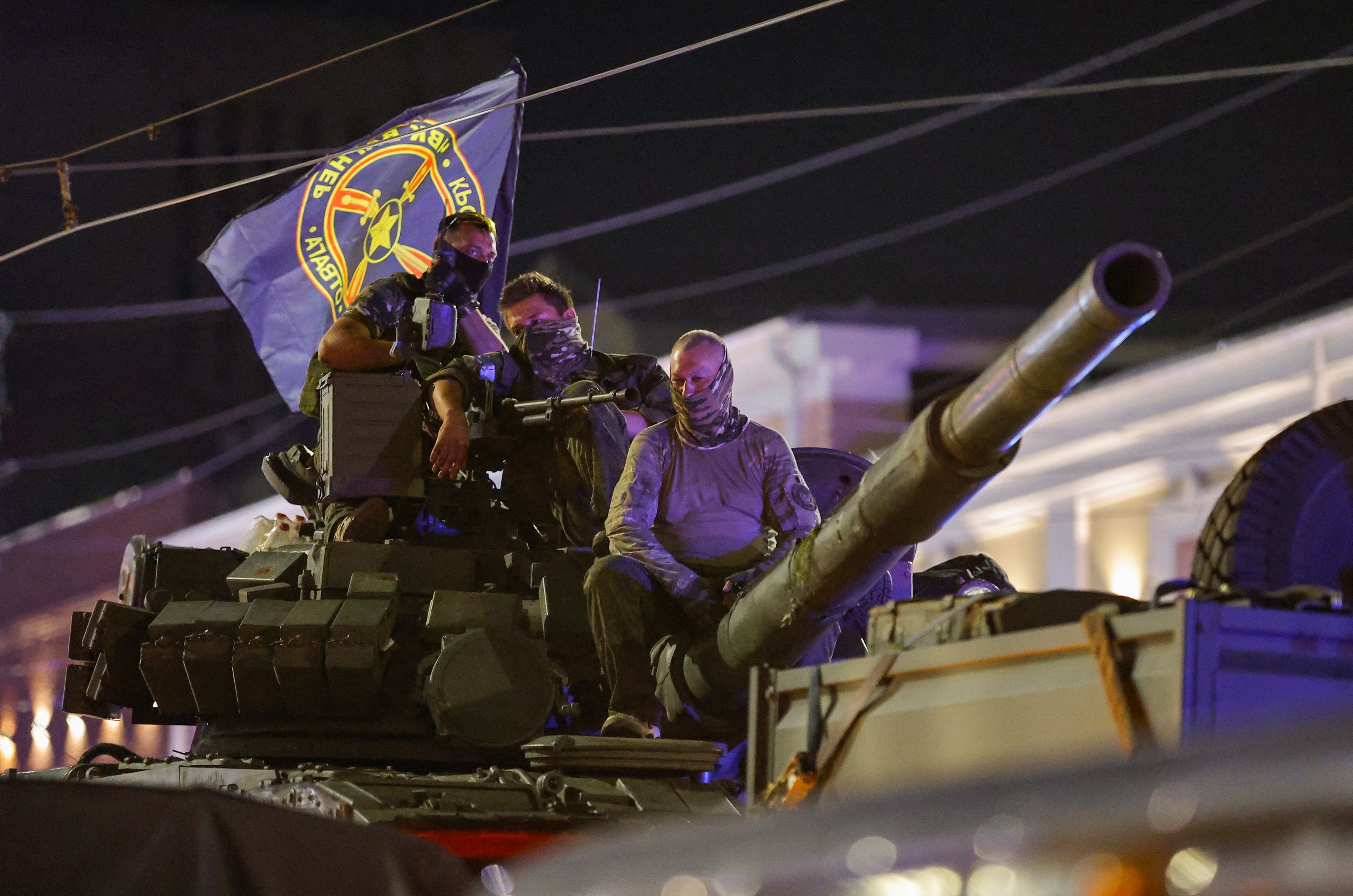 Fighters of Wagner private mercenary group pull out of the headquarters of the Southern Military District to return to base, in the city of Rostov-on-Don, Russia, June 24, 2023. REUTERS/Alexander Ermochenko