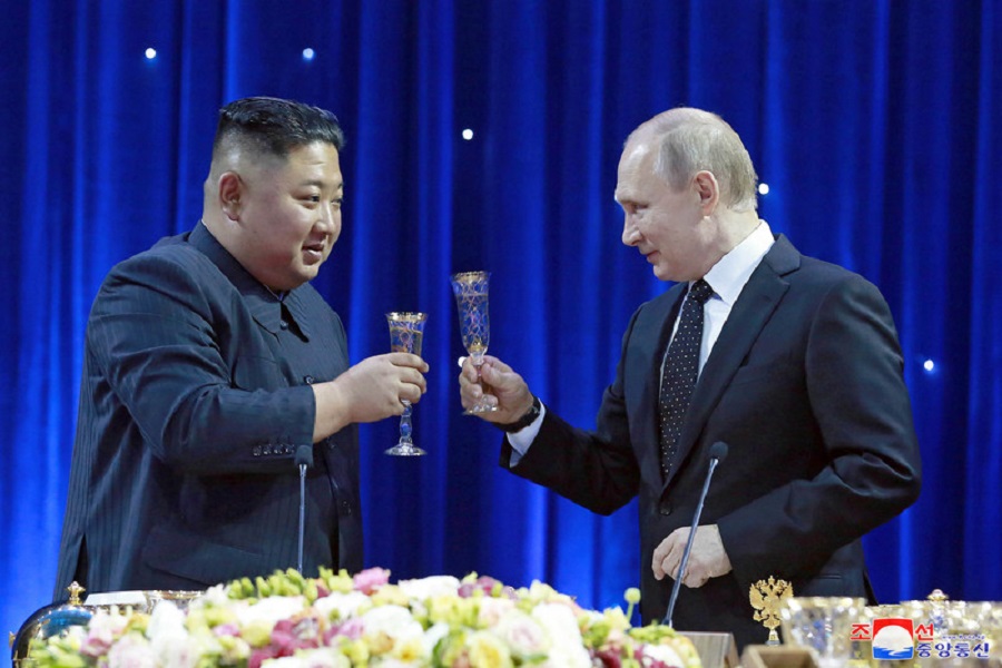 epa07528535 A photo released by the official North Korean Central News Agency (KCNA) shows North Korean leader Kim Jong-un (L) and Russian President Vladimir Putin (R) raising their glasses for a toast during a grand banquet after Russian - North Korean talks at the Far Eastern Federal University campus on the Russky Island in Vladivostok, Russia, 25 April 2019  EPA-EFE/KCNA   EDITORIAL USE ONLY