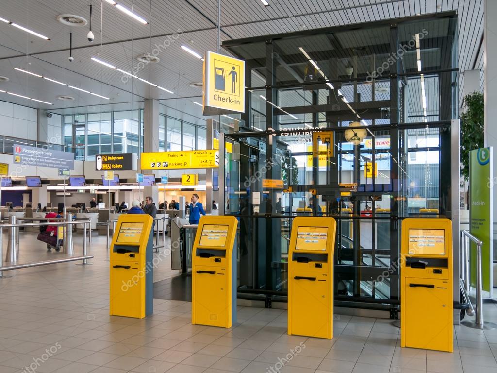 depositphotos_94528116-stock-photo-schiphol-amsterdam-airport-departure-terminal