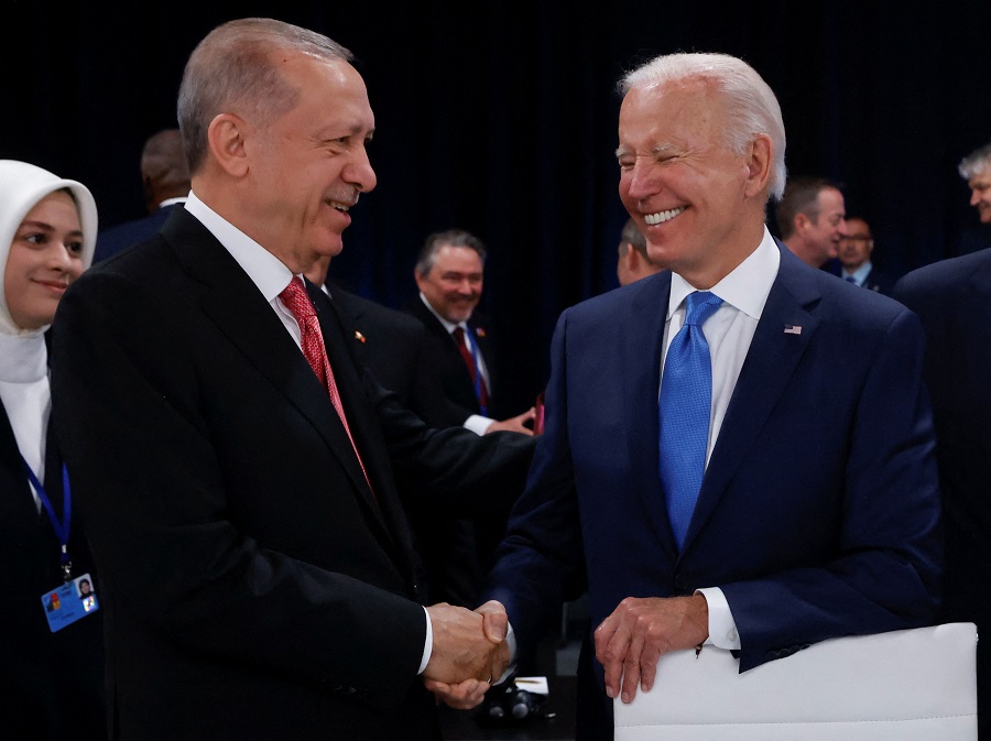 Turkish President Tayyip Erdogan and U.S. President Joe Biden attend a NATO summit in Madrid, Spain June 29, 2022. REUTERS/Yves Herman   