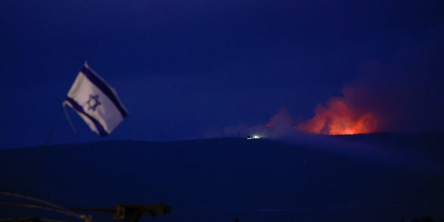 Flame and smoke rise over Lebanon as seen from Israel's border with Lebanon, in northern Israel, October 10, 2023. REUTERS/Ammar Awad