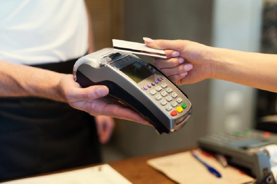 close-up-customer-paying-by-credit-card-