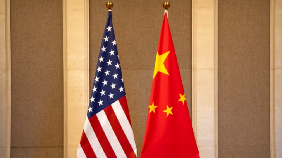 FILE - United States and Chinese flags are set up before a meeting between Treasury Secretary Janet Yellen and Chinese Vice Premier He Lifeng at the Diaoyutai State Guesthouse in Beijing, on July 8, 2023. Public opinions in 24 countries, mostly rich nations, have grown more favorable of the United States than of China, according to the latest survey by the Washington-based Pew Research Center.The gap in favorability of the world's two largest economies widened after views of the U.S. rebounded since President Joe Biden took office in 2021, the report found.  (AP Photo/Mark Schiefelbein, Pool, File)