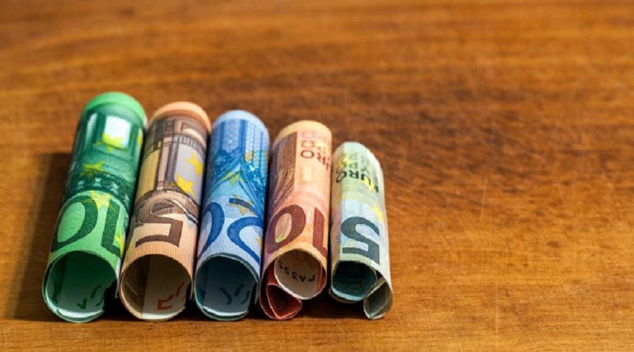 five-ten-twenty-fifty-one-hundred-euro-rolled-bills-