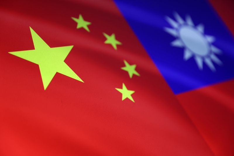 Chinese and Taiwanese flags are seen in this illustration, August 6, 2022. REUTERS/Dado Ruvic/Illustration/file photo