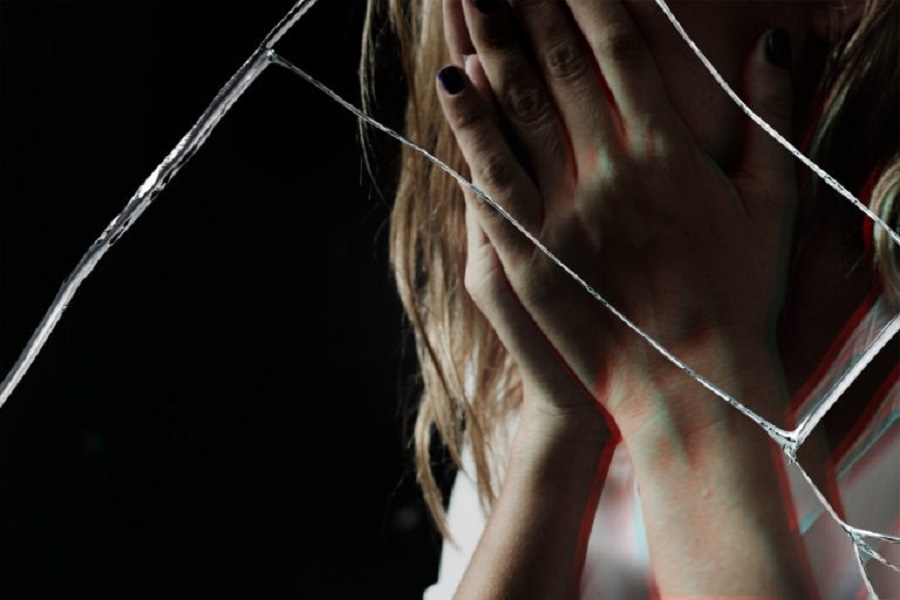 depressed-woman-with-cracked-glass-effect-