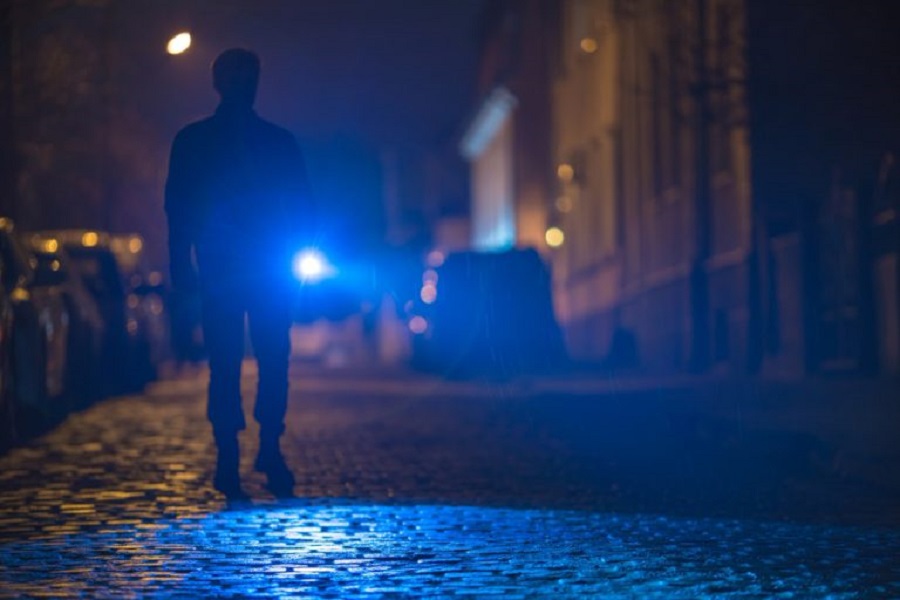 man-with-flashlight-inspect-road-evening-night-time-