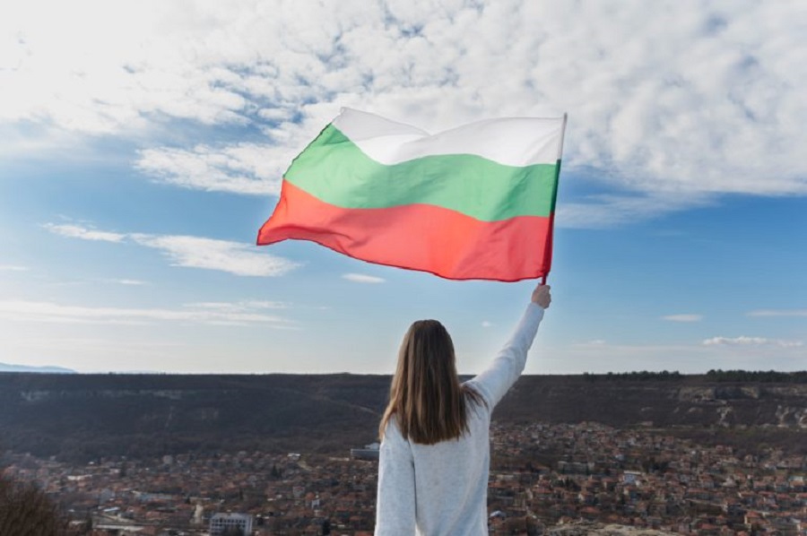 woman-holding-bulgarian-flag-outdoors-