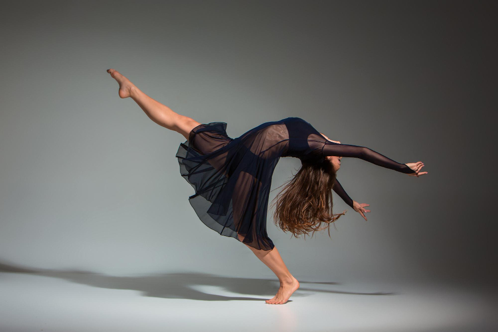 young-beautiful-dancer-black-dress-posing-dark-gray-studio-background-modern-contemporary-improvisation