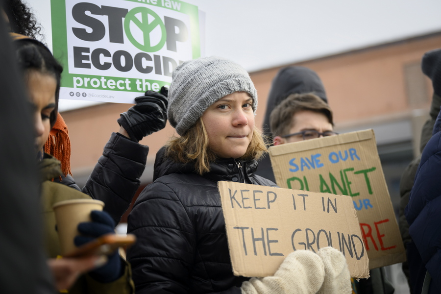 epa10417827 Sweden's climate activist Greta Thunberg and other young climate activists of the 'Friday for Future Climate Strike' movement stage an unauthorised demonstration on the sideline of the final day of the 53rd annual meeting of the World Economic Forum, WEF, in Davos, Switzerland, 20 January 2023. The meeting brings together entrepreneurs, scientists, corporate and political leaders in Davos under the topic 'Cooperation in a Fragmented World' from 16 to 20 January.  EPA/LAURENT GILLIERON