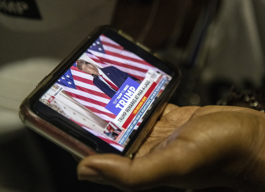 epa10307790 Supporters of the former US President Donald Trump listen to his announcement outside the Mar-a-Lago Club in Palm Beach, Florida, USA, 15 November 2022. Trump is expected to announce his third run at the presidency in the 2024 election.  EPA/CRISTOBAL HERRERA-ULASHKEVICH