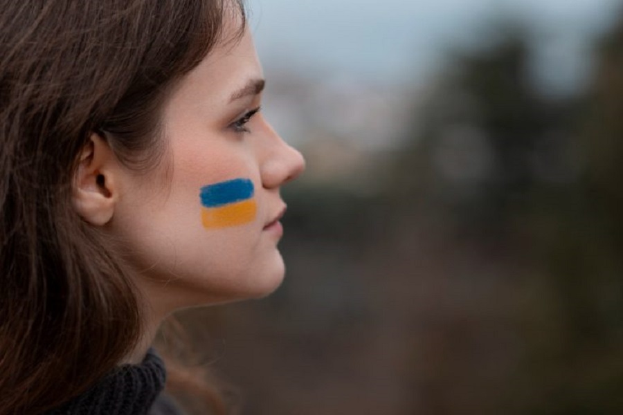 close-up-woman-with-ukranian-flag-drawing-