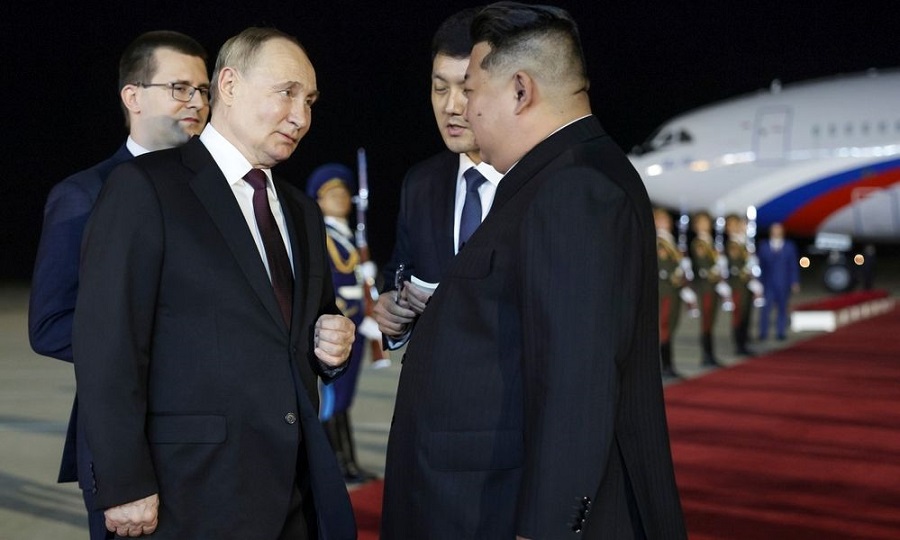 818dfeb4-putin-kim