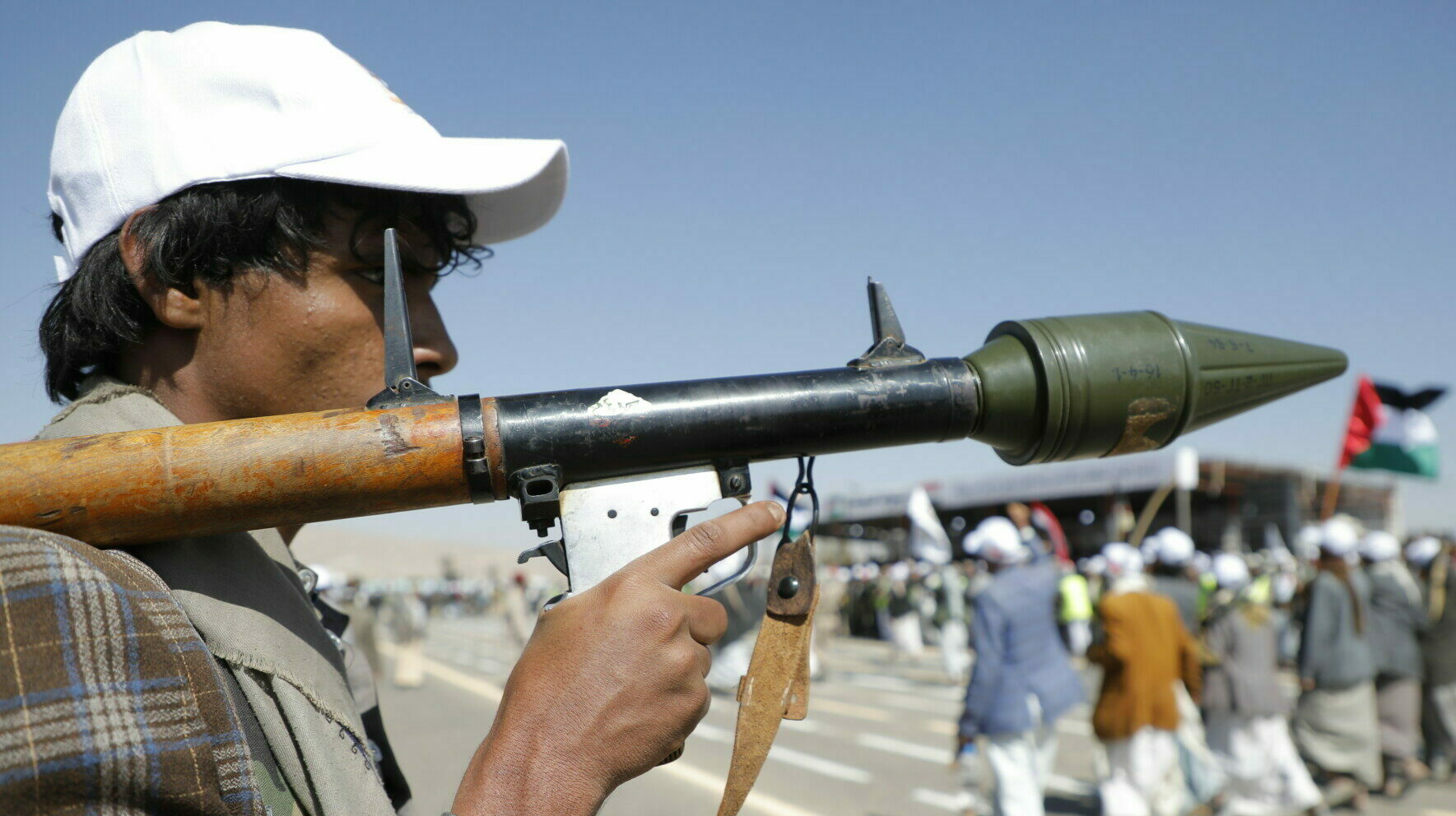 epa11038843 Newly-recruited members of the Houthis' popular army march during a parade in Amran province, Yemen, 20 December 2023. Yemen's Houthis have mobilized and recruited thousands of tribal militiamen as part of the creation of a popular army dedicated to a possible confrontation with Israel amid fears of a wider regional conflict stemming from the Israel-Hamas conflict. The Houthis have vowed to launch cross-border missile and drone attacks on Israel and attack Israeli ships in the Red Sea. Thousands of Israelis and Palestinians have died since the militant group Hamas launched an unprecedented attack on Israel from the Gaza Strip on 07 October, and the Israeli strikes on the Palestinian enclave that followed it.  EPA/OSAMAH YAHYA