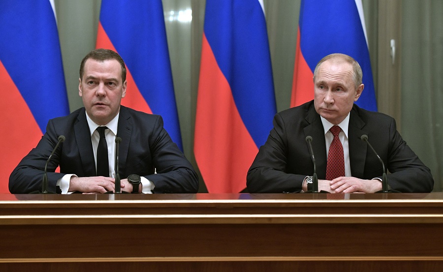 Russian President Vladimir Putin, right, and Russian Prime Minister Dmitry Medvedev attend a cabinet meeting in Moscow, Russia, Wednesday, Jan. 15, 2020. The Tass news agency reports Wednesday that Russian Prime Minister Dmitry Medvedev submitted his resignation to President Vladimir Putin. Russian news agencies said Putin thanked Medvedev for his service but noted that the prime minister's Cabinet failed to fulfil all the objectives set for it. (Alexei Nikolsky, Sputnik, Kremlin Pool Photo via AP)