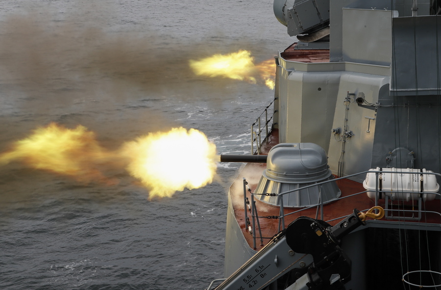 epa10160976 Russian large anti-submarine ship Marshal Shaposhnikov fires the AK-630 fully automatic naval, rotary cannons during the Vostok 2022 strategic command and staff exercise in the Peter the Great Gulf of the Sea of Japan, near Vladivostok, Russia, 05 September 2022. The Vostok 2022 strategic command and staff exercise will take place from 01 to 07 September 2022 and will involve over 50,000 servicemen and more than 5,000 units of weapons and military equipment.  EPA/YURI KOCHETKOV