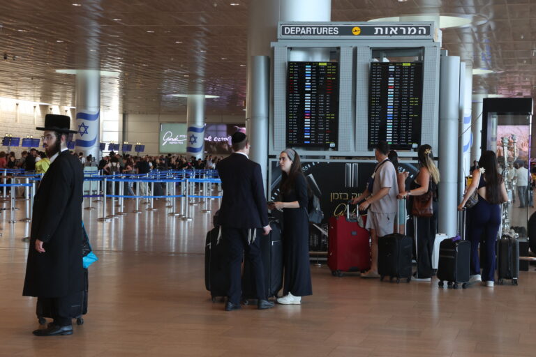 Passengers wait for their fligts at Ben Gurion airport near Tel Aviv on August 6, 2024, amid regional tensions during the ongoing war between Israel and the Palestinian Hamas movement in the Gaza Strip. The United States said it was working "around the clock" to avert an all-out war in the Middle East, as Israel remained on high alert for potential Iranian retaliation for two high-profile killings. (Photo by GIL COHEN-MAGEN / AFP)