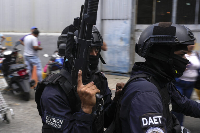 FILE - Police on a motorcycle leave the Boleita National Police detention center where some people arrested during recent protests against the official results of the presidential election are being held, in Caracas, Venezuela, Aug. 1, 2024. (AP Photo/Matias Delacroix, File)