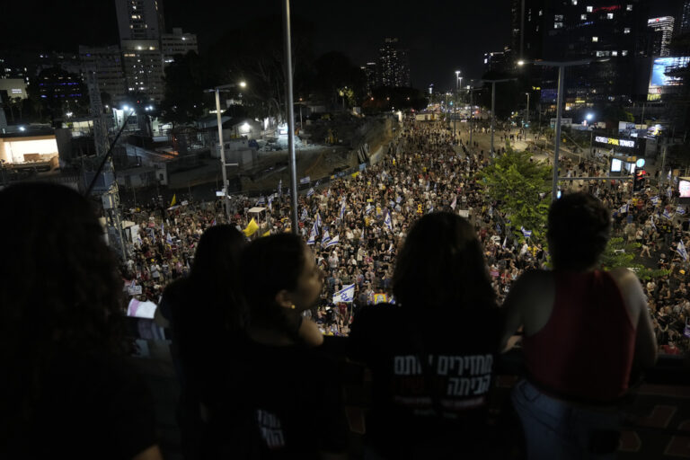 Relatives of hostages held by Hamas in the Gaza Strip and their supporters call for the immediate release of hostages held by the militant group, and protest against Israeli Prime Minister Benjamin Netanyahu's government in Tel Aviv, Israel, Saturday, Aug. 10, 2024. (AP Photo/Mahmoud Illean)